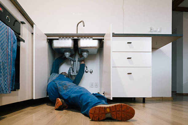Professional Emergency Plumber technician working in Dawson, MN
